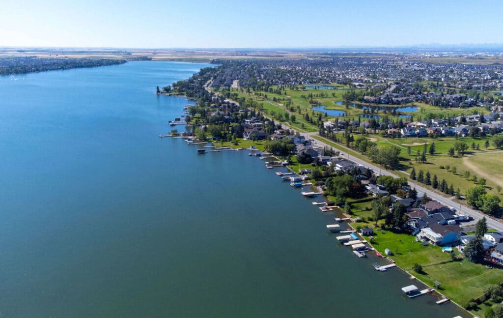 Aerial view of lake and residential area.